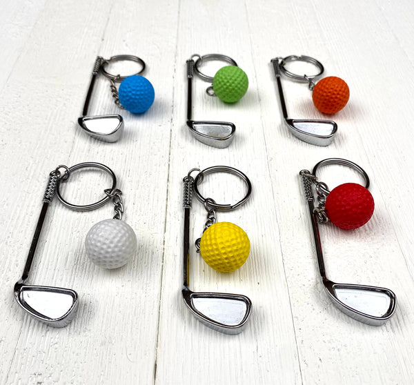 Golf club and ball set keychain. Silver Metal Golf club keychain. Orange Golf ball keychain. Golf players keychain. Golf coach keychain. Sports keychain.