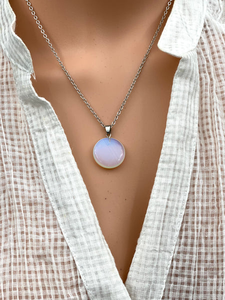 An Eye catching synthetic Opal stone round shape Pendant Necklace with High Quality No Fade Non Tarnish Hypoallergenic Stainless Steel chain