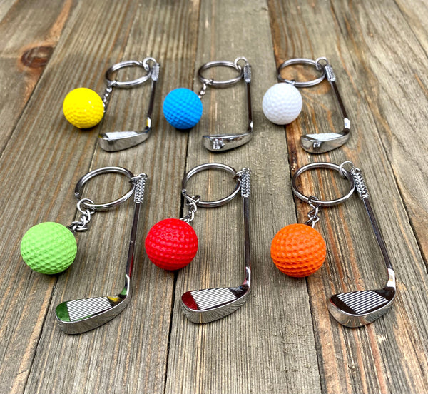 Golf club and ball set keychain. Silver Metal Golf club keychain. Orange Golf ball keychain. Golf players keychain. Golf coach keychain. Sports keychain.